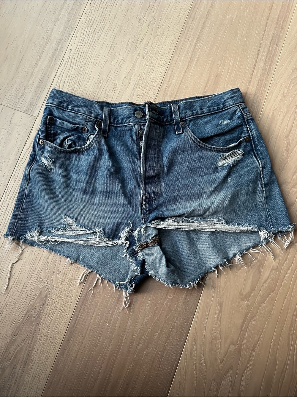 Levi’s Distressed Blue Denim Cutoff Shorts